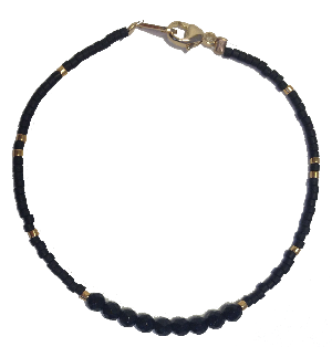 Bracelet Dubaï, Perles en verre noires, perles en verre dorées à l'or fin 24 carats, et perles d'onyx, 39 €